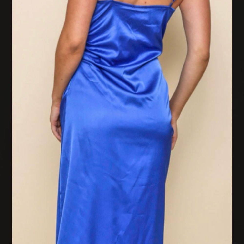 Gorgeous royal blue dress..  new without tags. Never worn.  Sexy and classy !